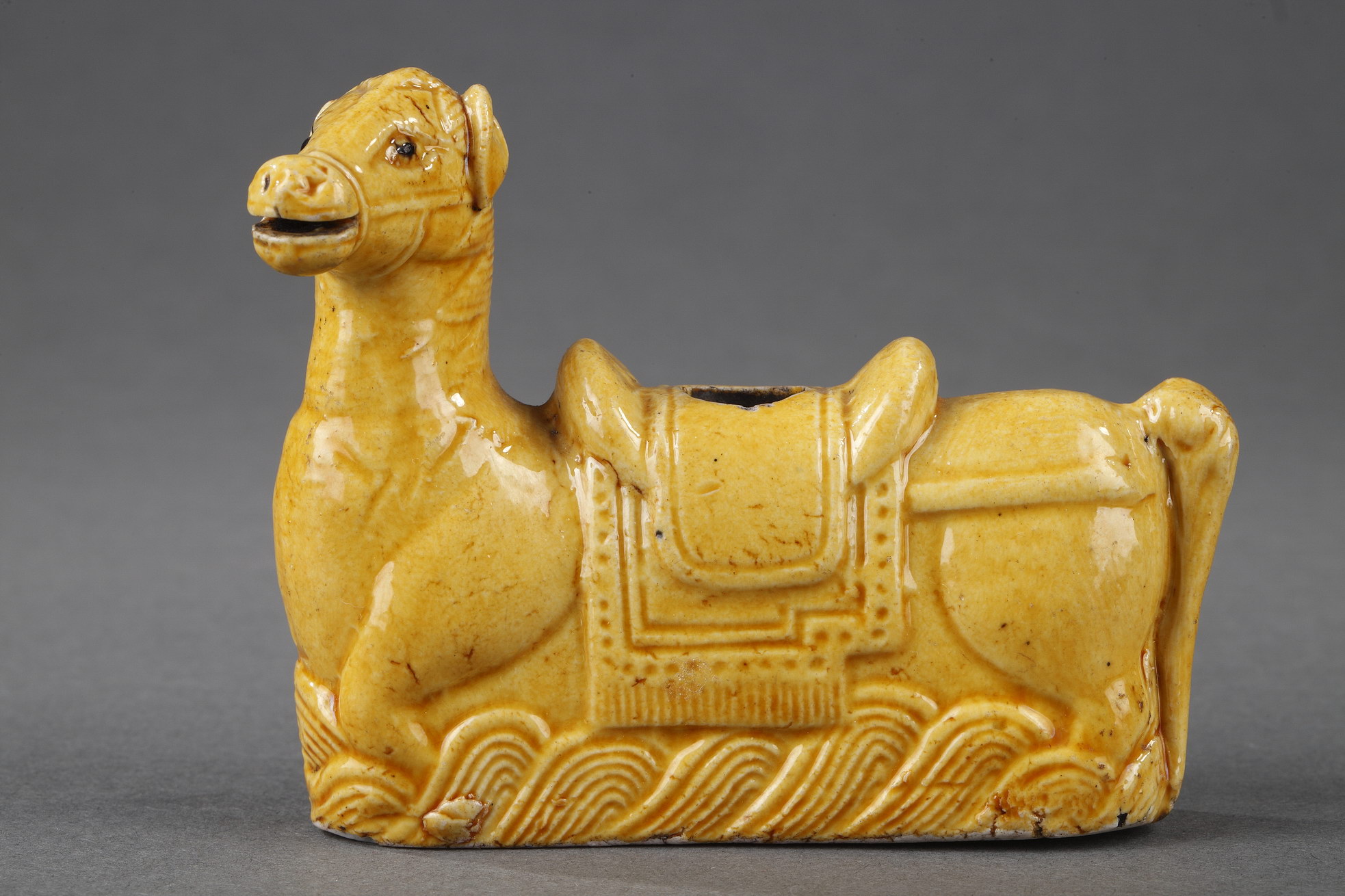 Chinese yellow enamelled biscuit water dropper in the shapeof a horse